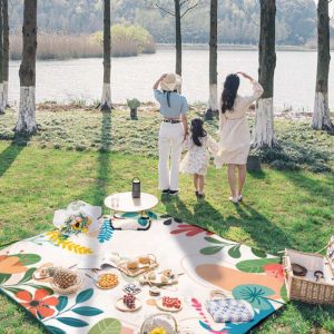 Portable picnic mat with botanical floral pattern